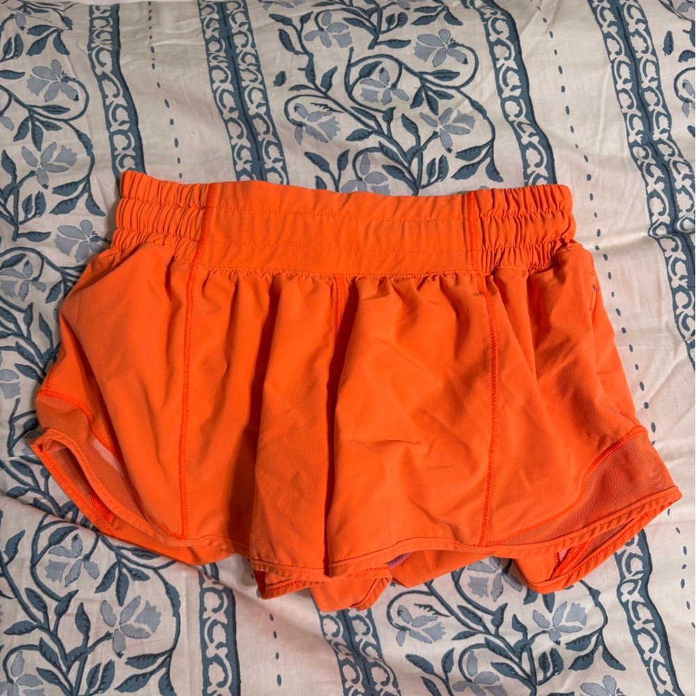 Bright orange lululemon speed ups low rise 2.5 inch, size 2